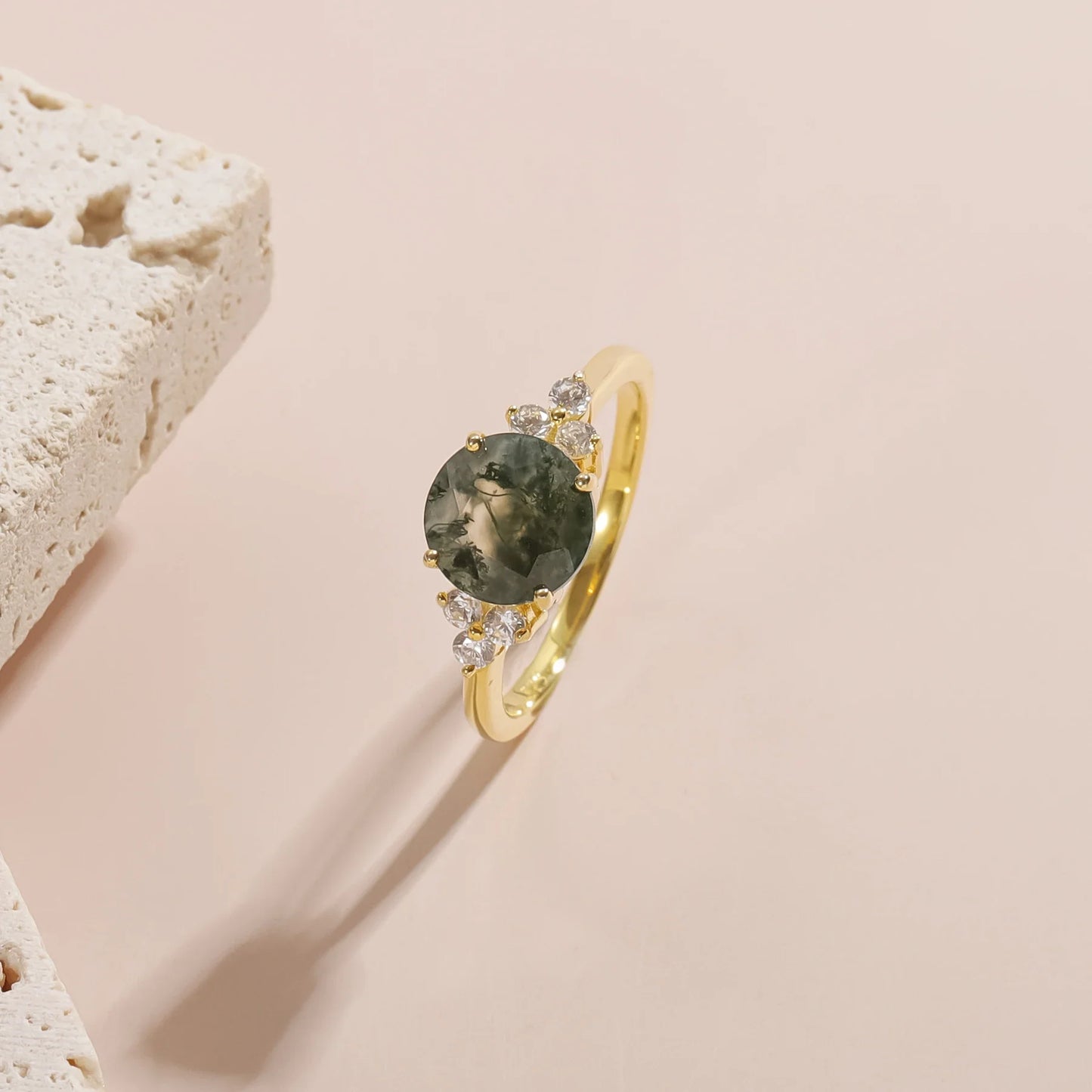 Moss agate ring with a round moss agate and three cz on each side gold promise ring