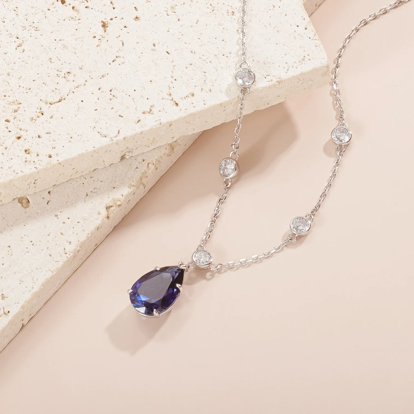 Silver sapphire necklace with a lab-created blue sapphire stone pendant necklace