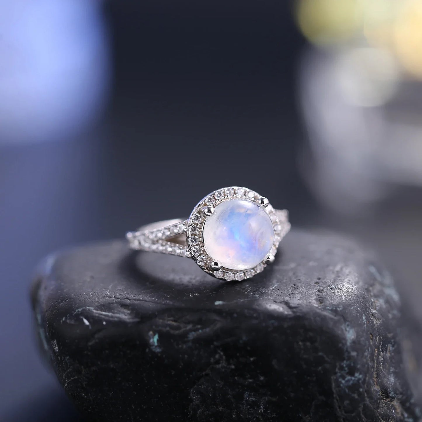 Large moonstone ring with a round moonstone and cz stones