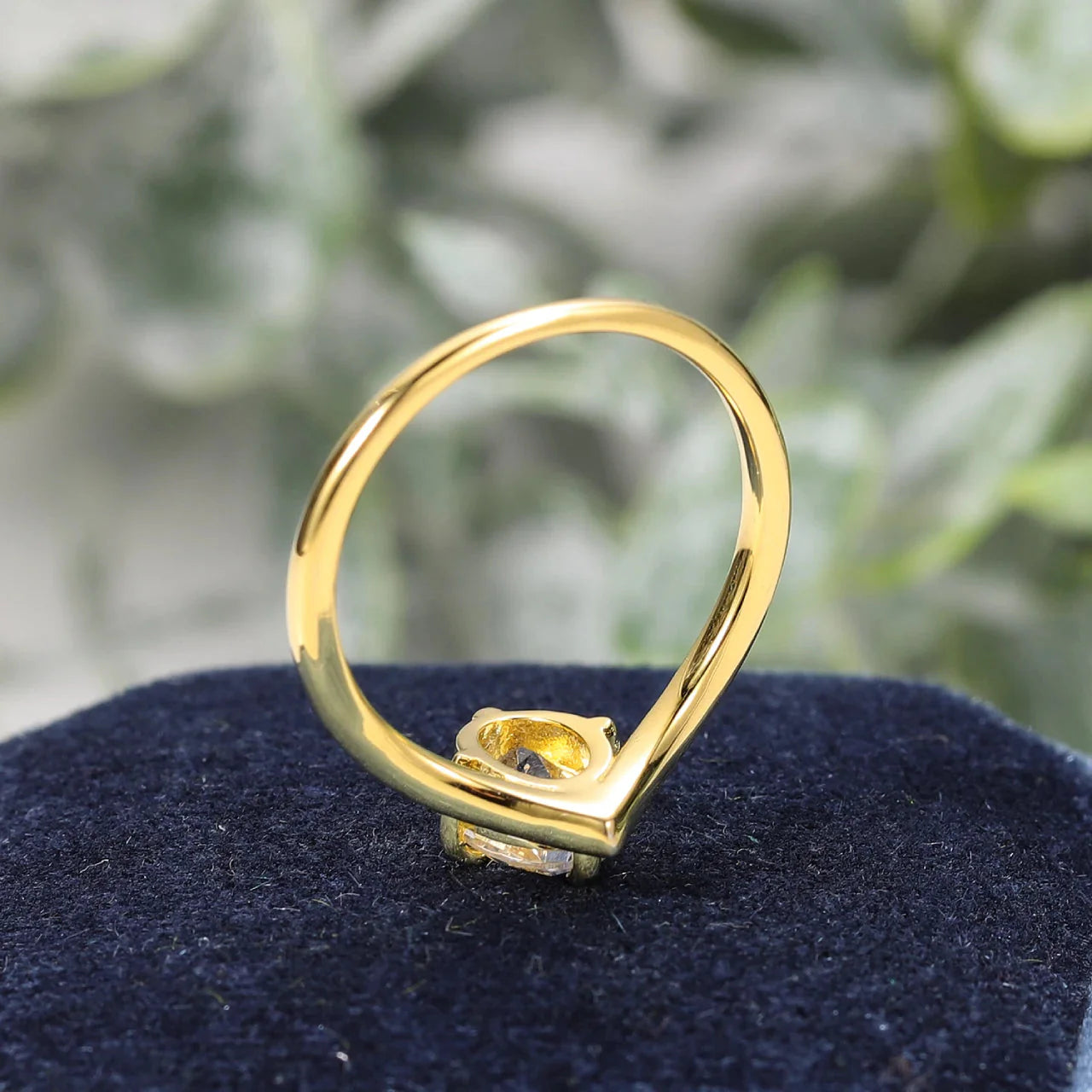 Curved moissanite wedding band oval cut