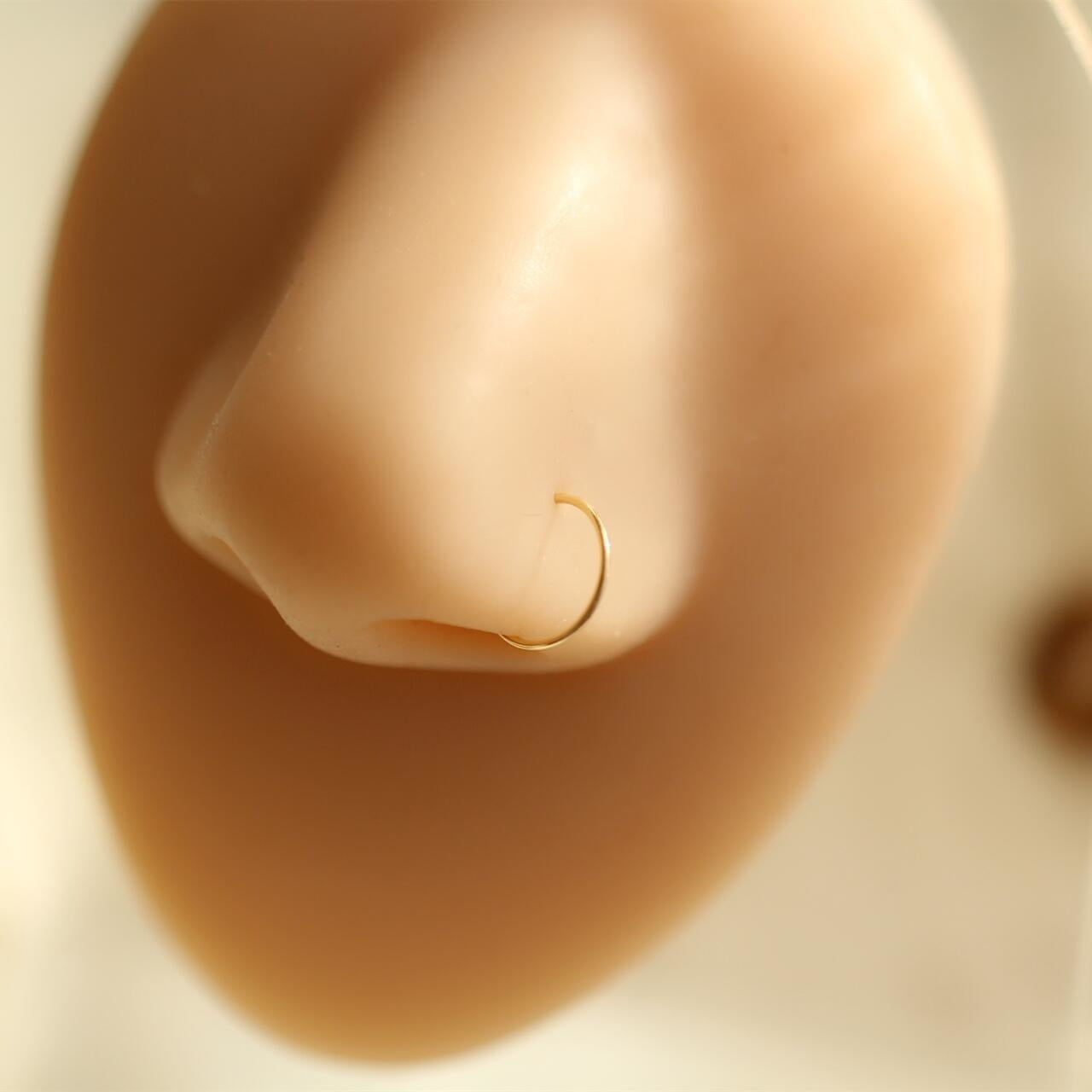 14K gold nose ring simple and minimalist