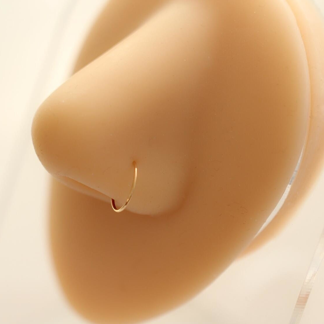 14K gold nose ring simple and minimalist