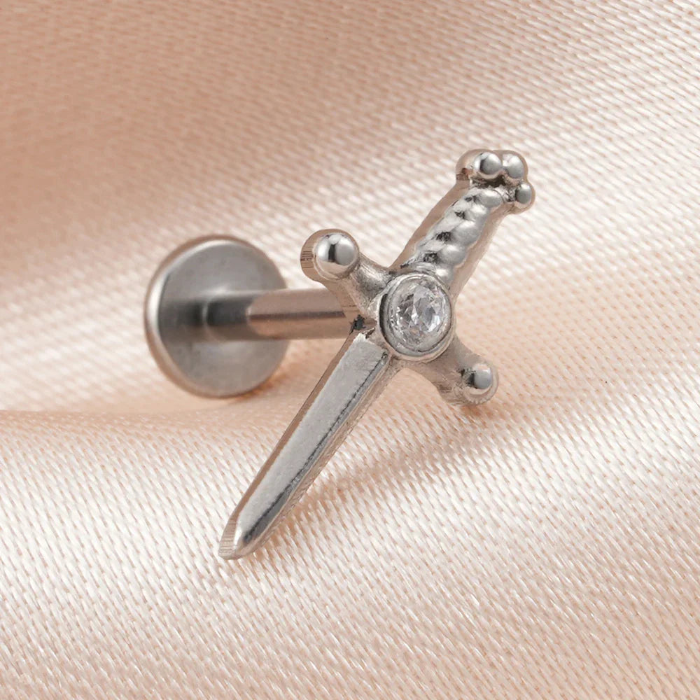 Dagger earring stud with a cz stone titanium gold and silver labret piercing 16G internally threaded sword ear stud