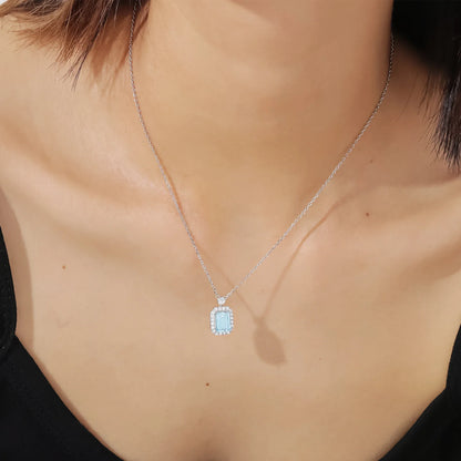 Birthstone topaz necklace with a natural sky blue topaz and clear diamond cz stones silver pendant necklace