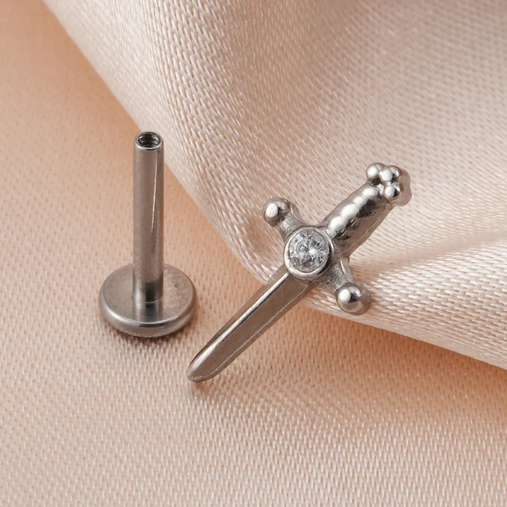 Dagger earring stud with a cz stone titanium gold and silver labret piercing 16G internally threaded sword ear stud