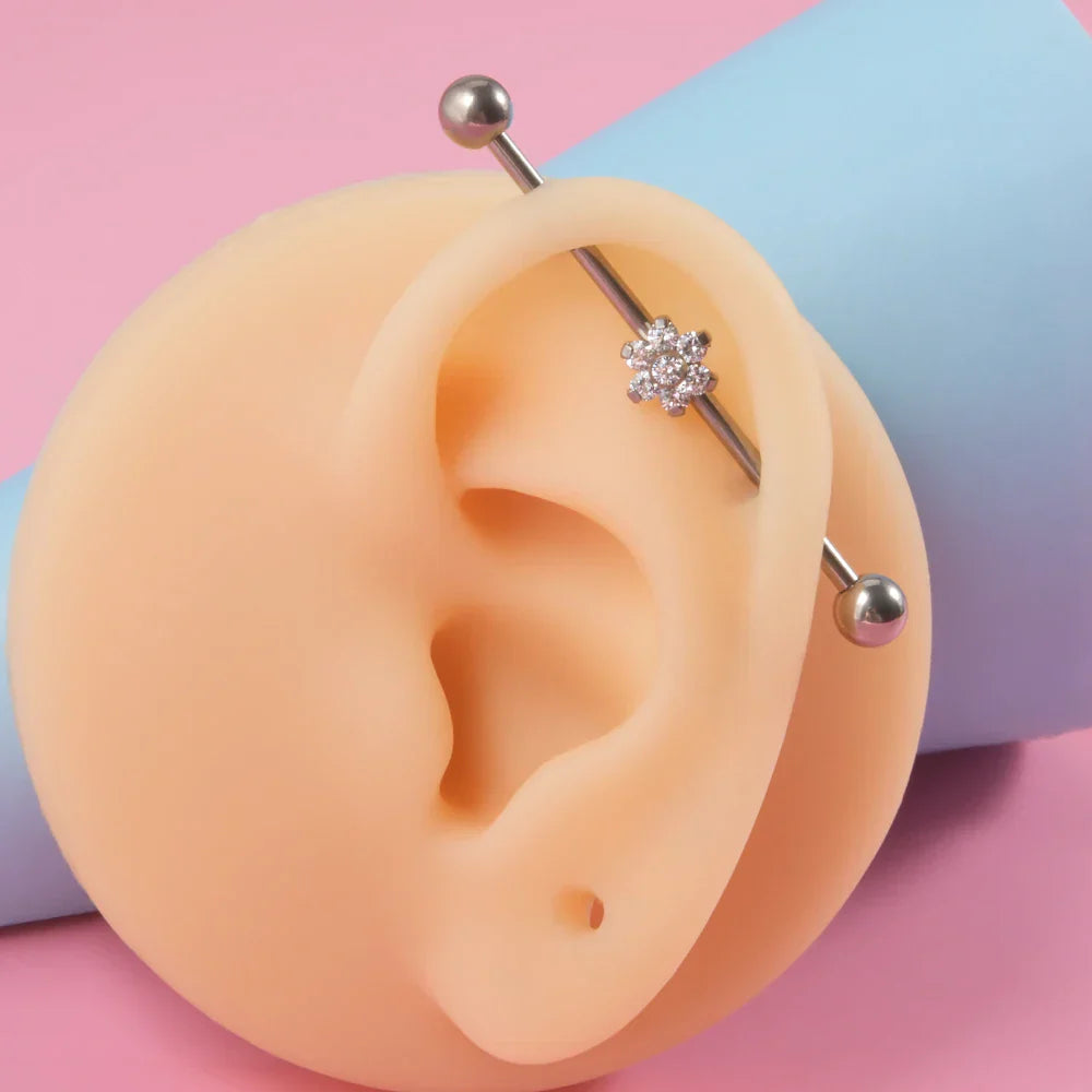 Opal industrial piercing with a flower clear white and blue opal barbell piercing titanium 14G