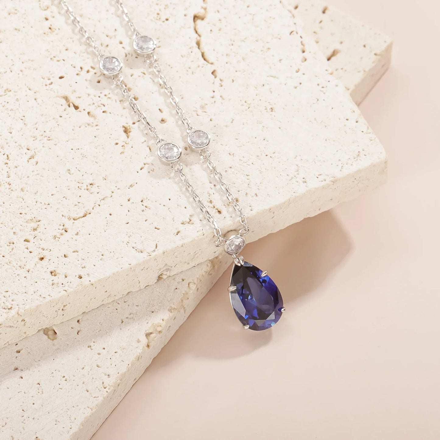 Silver sapphire necklace with a lab-created blue sapphire stone pendant necklace