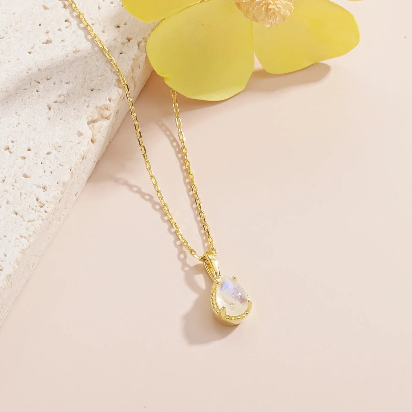 Moonstone crystal necklace in a teardrop shape dainty gold necklace