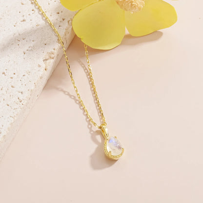 Moonstone crystal necklace in a teardrop shape dainty gold necklace
