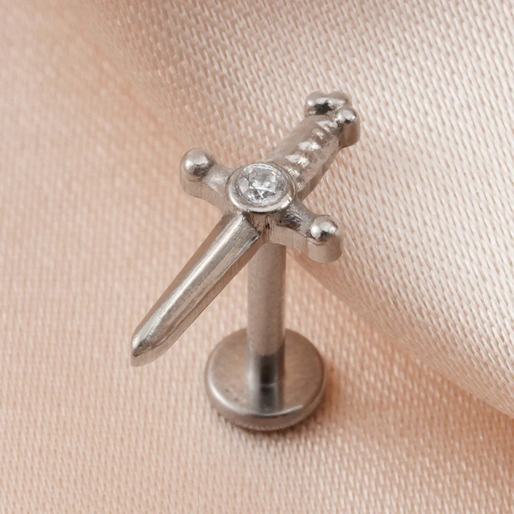 Dagger earring stud with a cz stone titanium gold and silver labret piercing 16G internally threaded sword ear stud