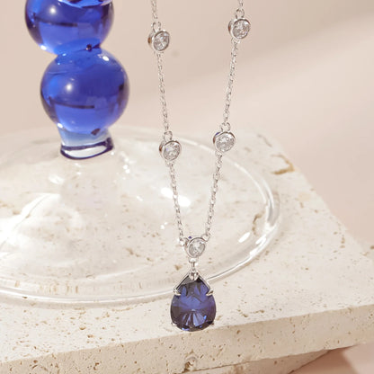 Silver sapphire necklace with a lab-created blue sapphire stone pendant necklace