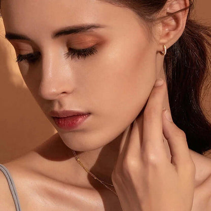 Gold huggie earrings