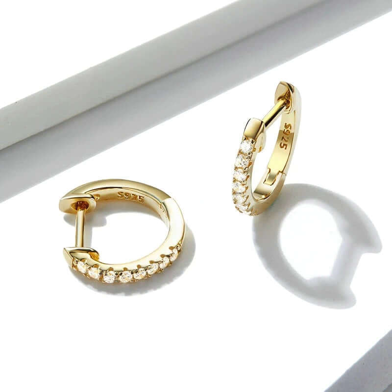 Gold huggie earrings