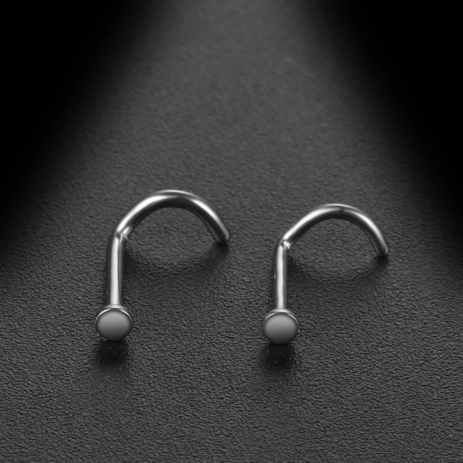 Tiny nose stud with a flat round disc titanium 18G 20G