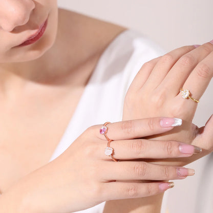 Rose gold moonstone ring with clear cz arranged in a half circle wedding ring for women