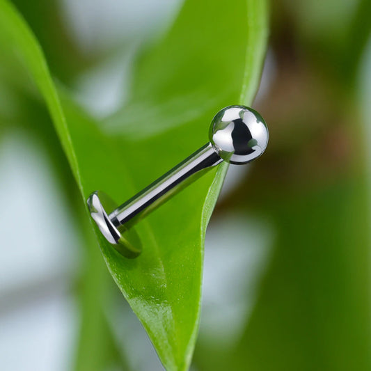 Flat back nose stud with a ball titanium