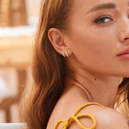 Gold huggie earrings