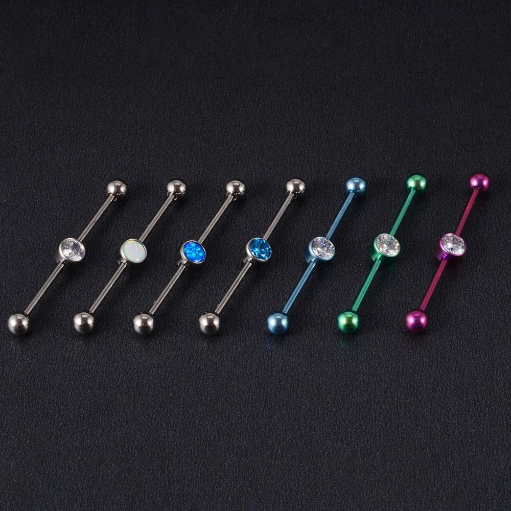Cool industrial piercing with a clear diamond titanium industrial barbell 14G 38mm pink green blue silver