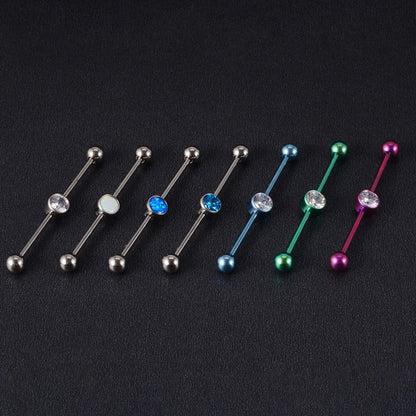 Cool industrial piercing with a clear diamond titanium industrial barbell 14G 38mm pink green blue silver