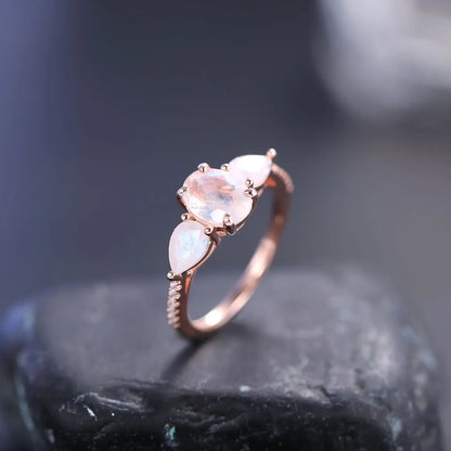 Three-stone ring with natural moonstones art deco