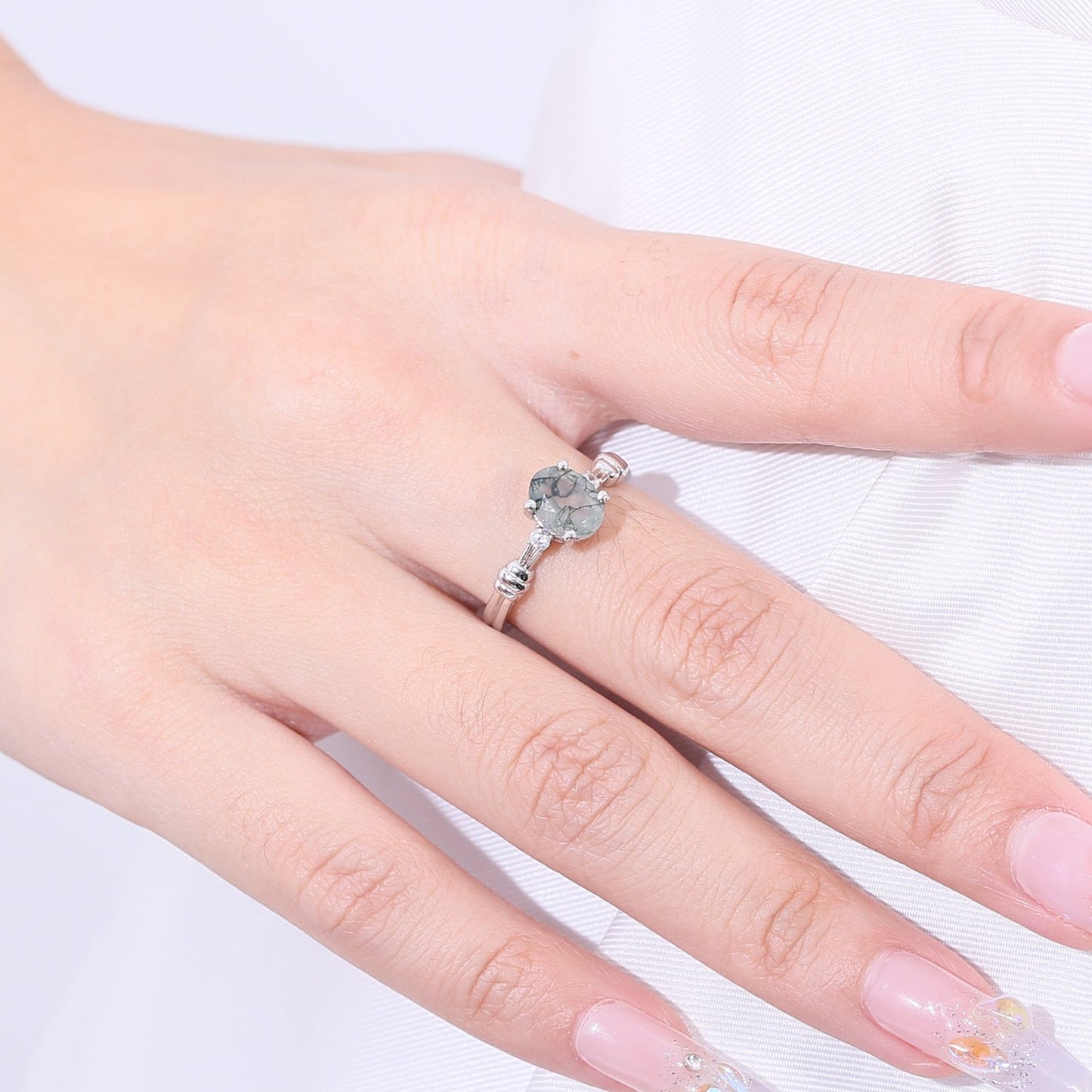 Nature-inspired moss agate engagement ring in silver