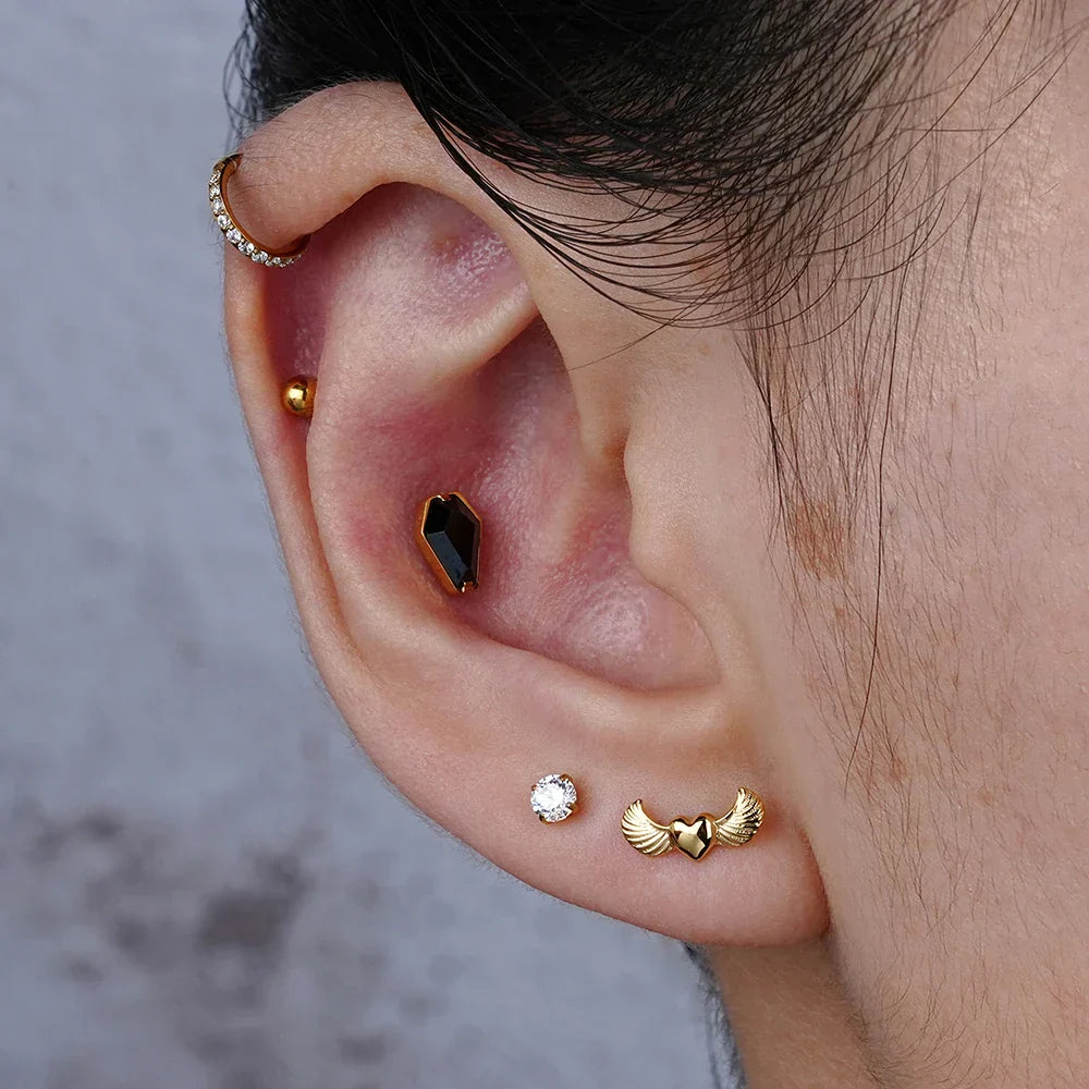 Gold medusa piercing coffin shaped with red green black diamond CZ titanium stud 16G