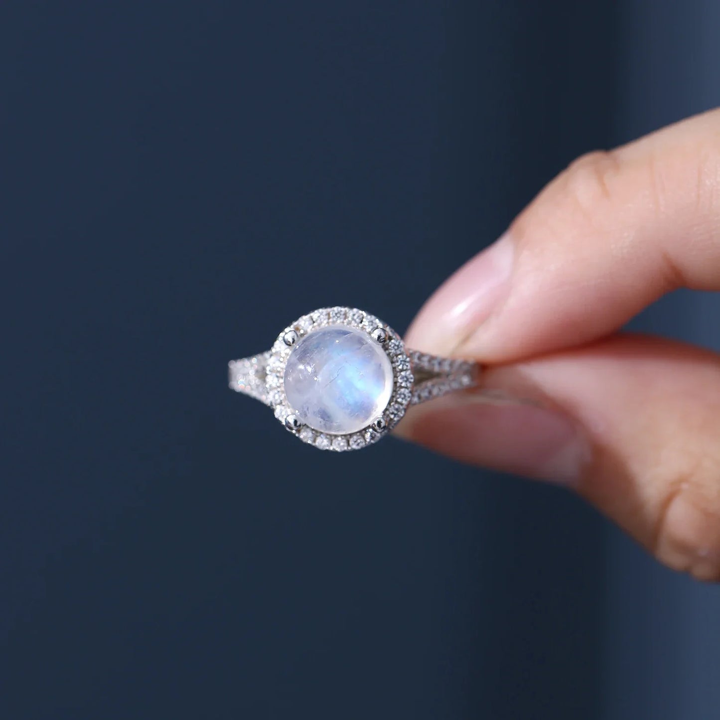 Large moonstone ring with a round moonstone and cz stones