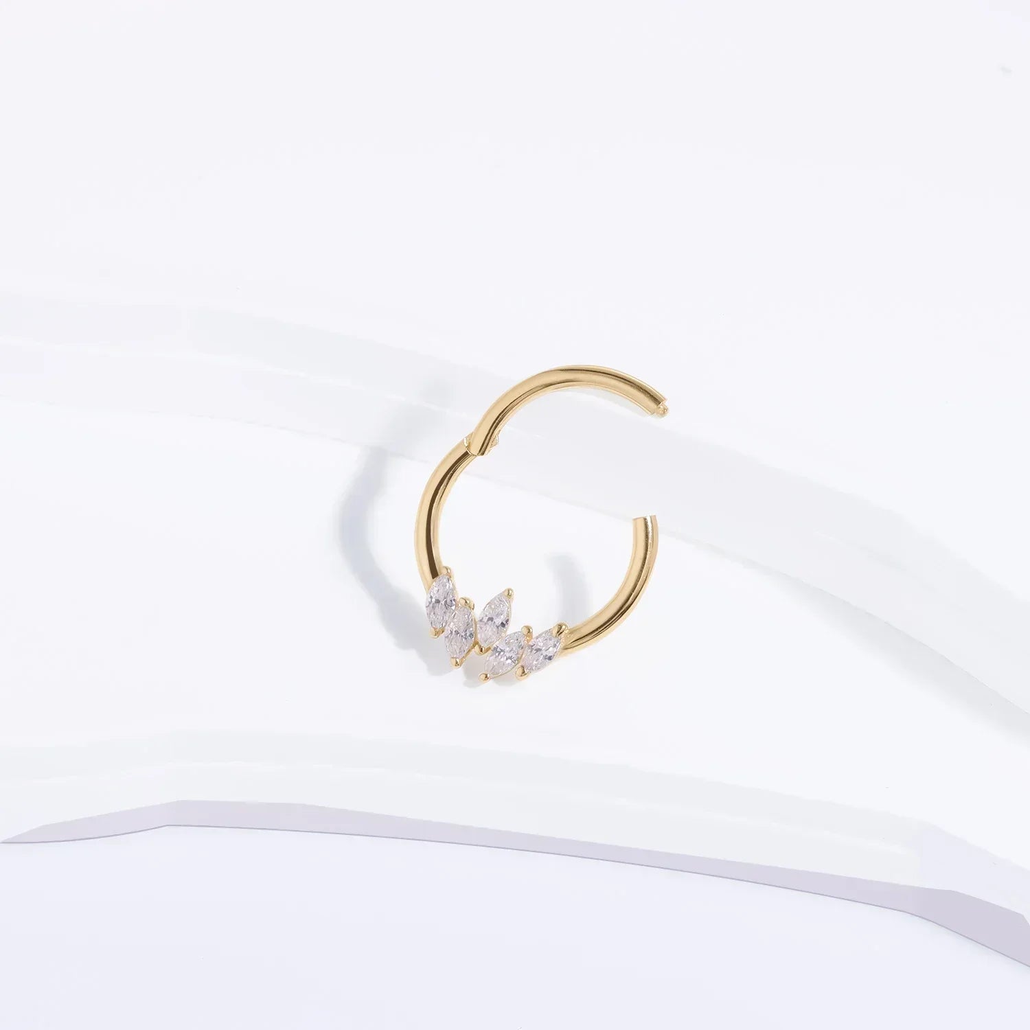 Rosary Milano gold hoop earring with marquise-cut crystals on white background
