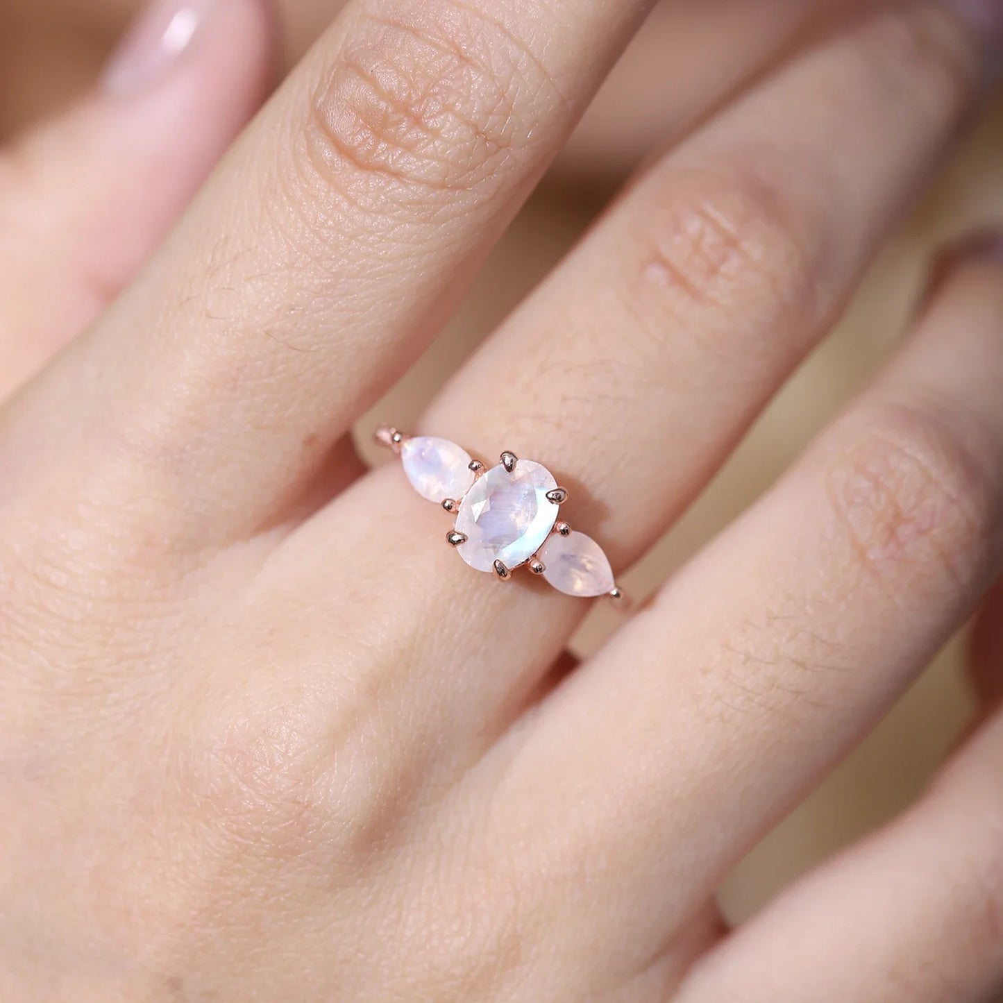 Three-stone ring with natural moonstones art deco