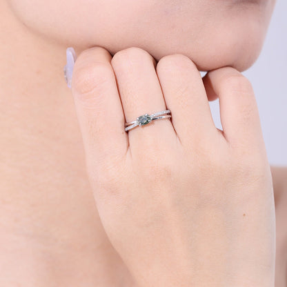 Moss agate wedding ring with a cross-shaped design in silver
