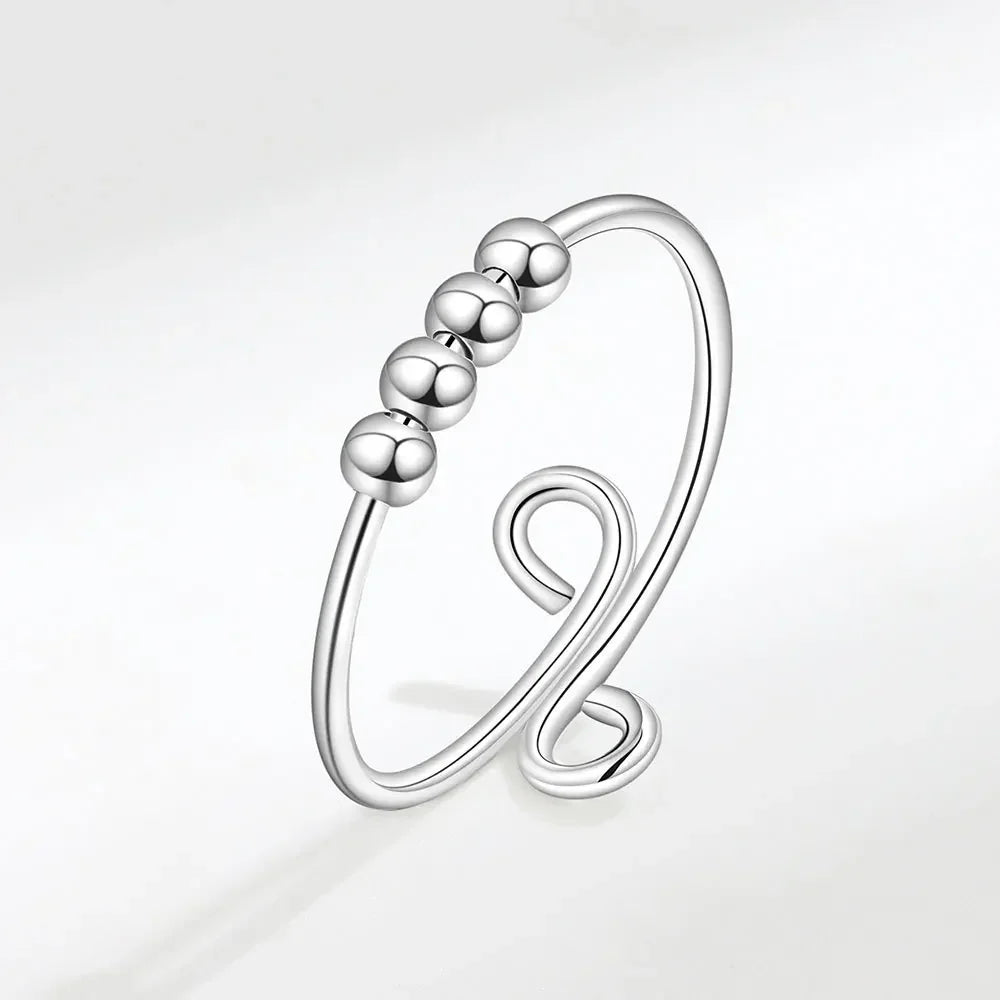 Minimalist silver beaded ring from Rosary Milano fashion jewelry collection on white background