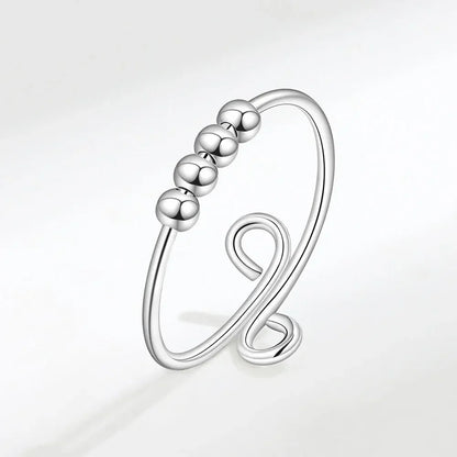 Minimalist silver beaded ring from Rosary Milano fashion jewelry collection on white background