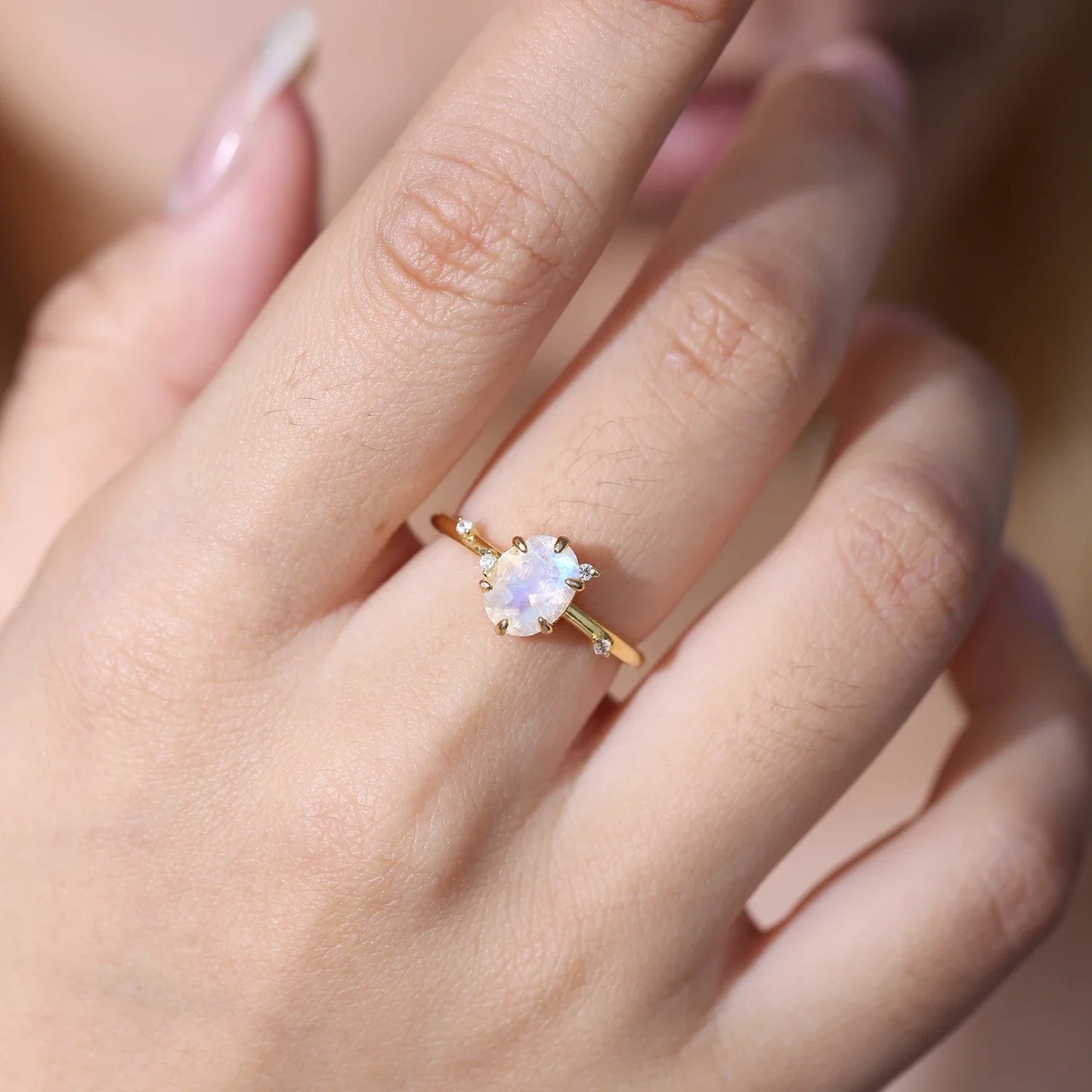 Leaf ring with a natural moonstone in gold