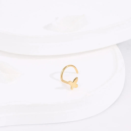 Minimalist gold butterfly adjustable ring on white display, Rosary Milano fashion jewelry