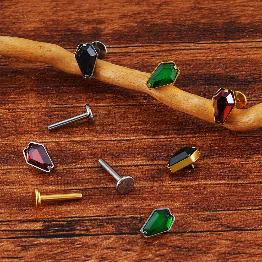 Gold medusa piercing coffin shaped with red green black diamond CZ titanium stud 16G