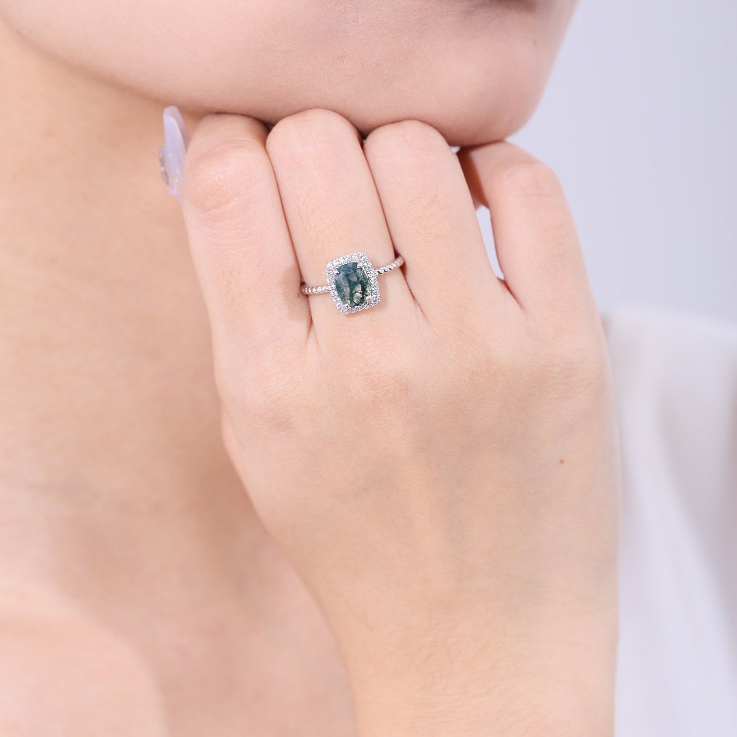 Moss agate engagement ring in silver halo ring rectangle shaped