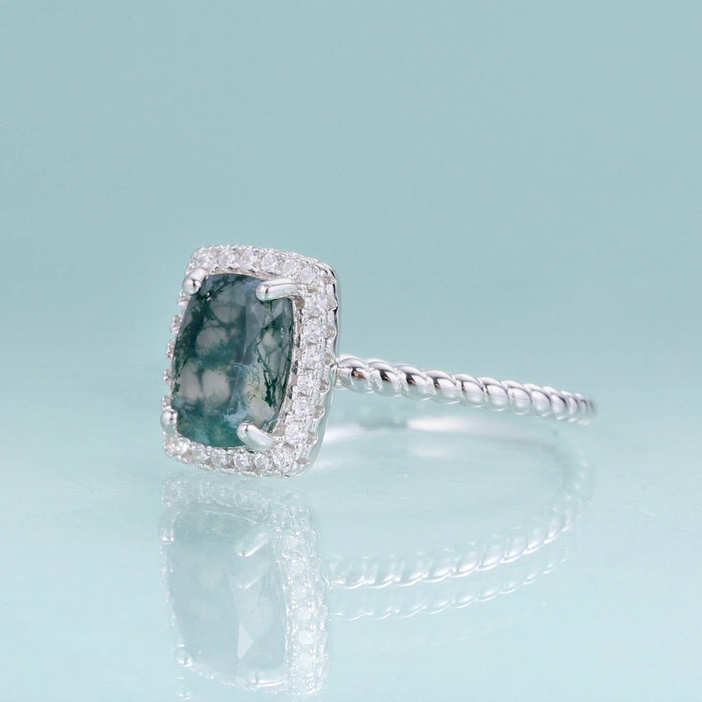 Moss agate engagement ring in silver halo ring rectangle shaped