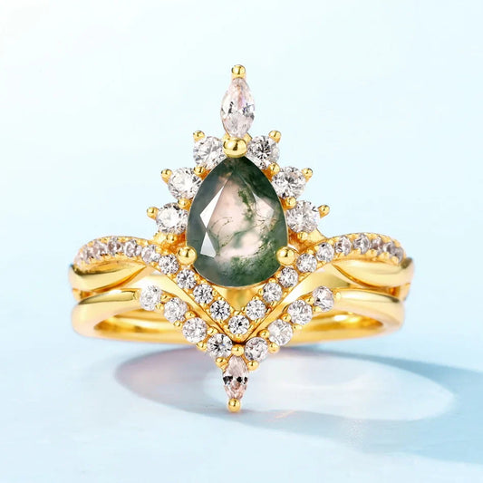 Moss agate wedding ring set with a pear-shaped moss agate sterling silver