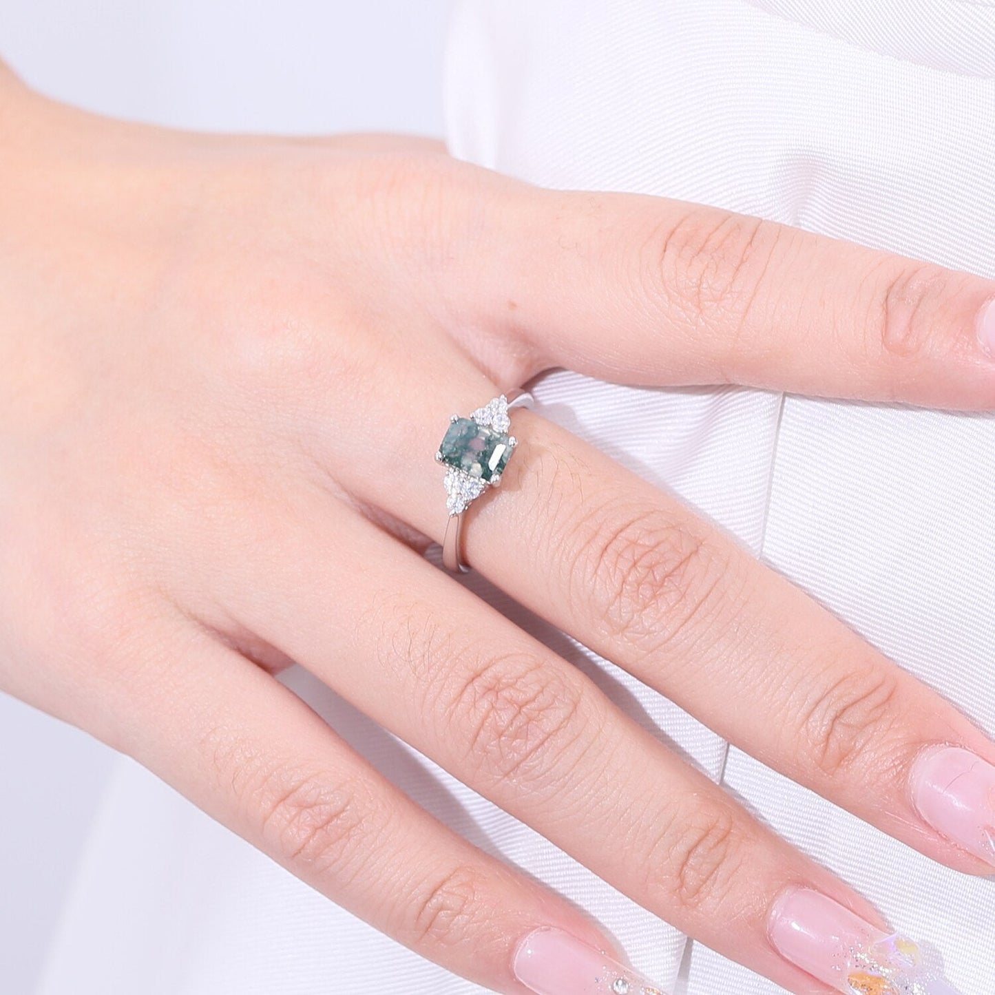 Emerald cut moss agate ring in silver