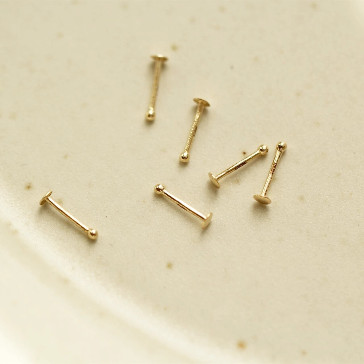 Nose bone stud 14K gold tiny and minimalist