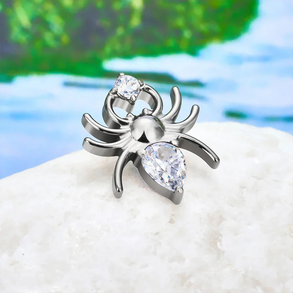 Spider nose stud with a clear pink or red diamond spider stud earring titanium piercing stud