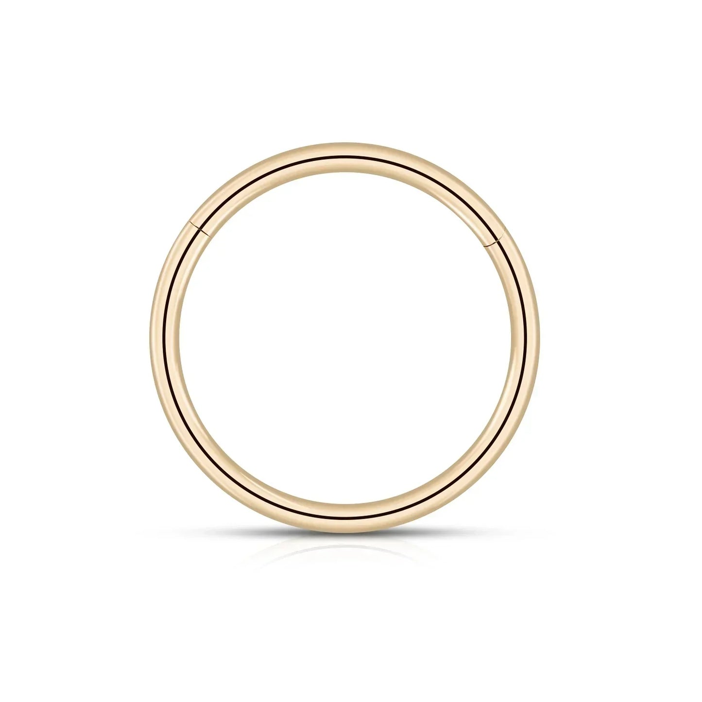 Minimalist gold hoop earring on white background, fashion jewelry by Rosary Milano