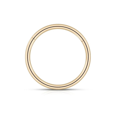 Minimalist gold hoop earring on white background, fashion jewelry by Rosary Milano
