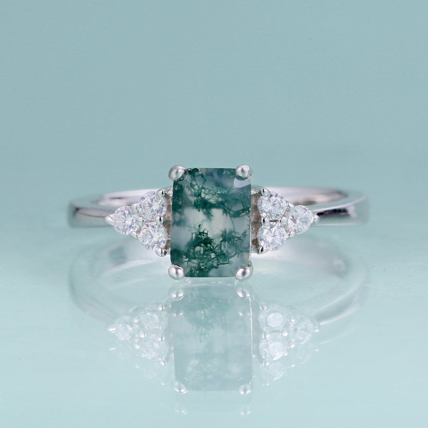 Emerald cut moss agate ring in silver