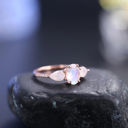 Three-stone ring with natural moonstones art deco