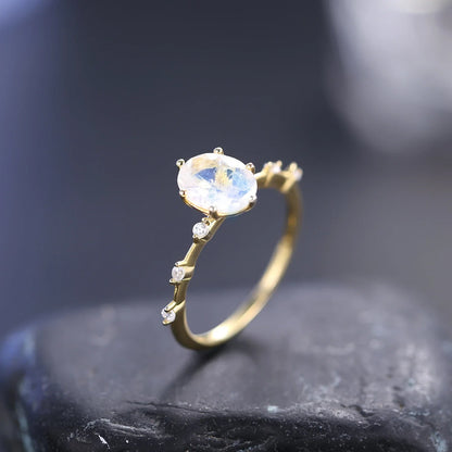 Moonstone promise ring with a think band stacking ring