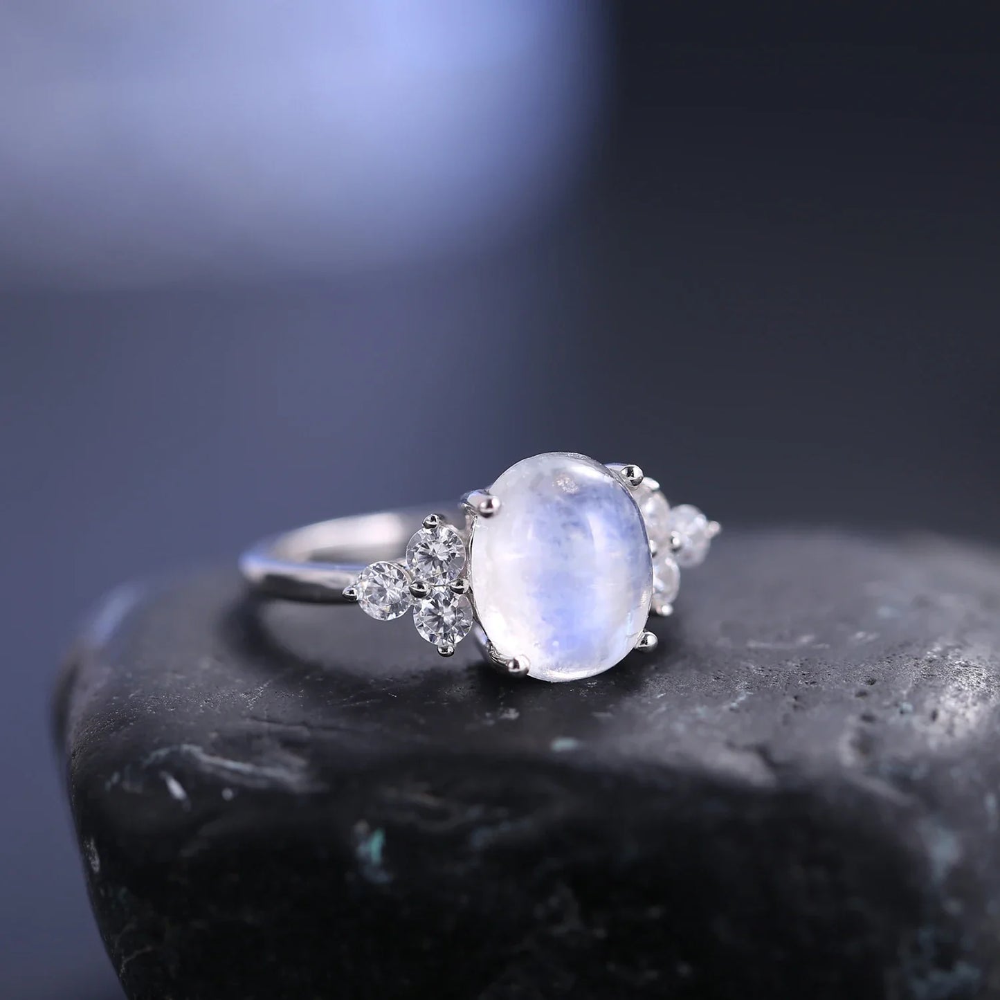 Silver moonstone ring with an oval moonstone and clear diamond cz