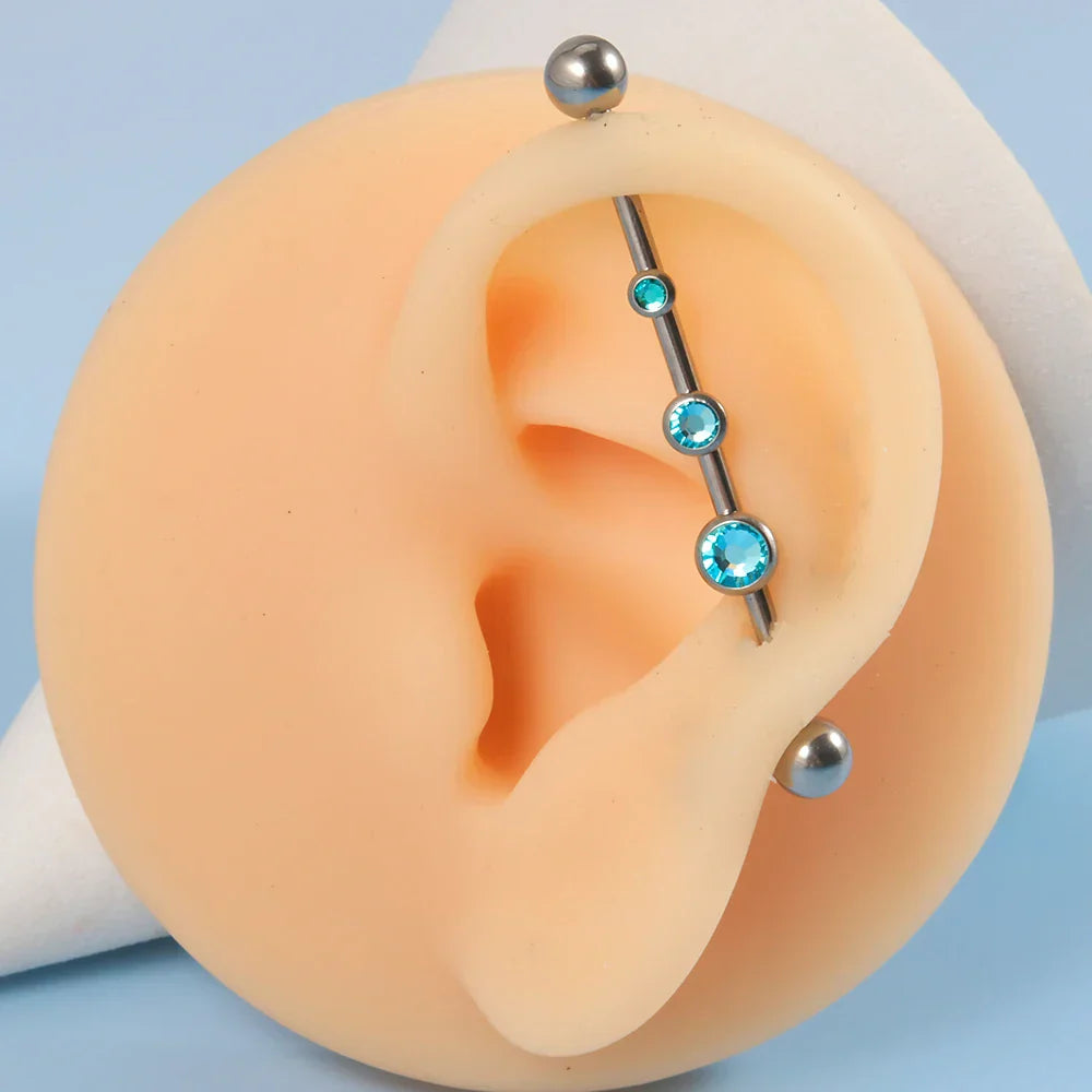 Diamond industrial bar with 3 clear pink blue CZ stones 14G 38mm titanium