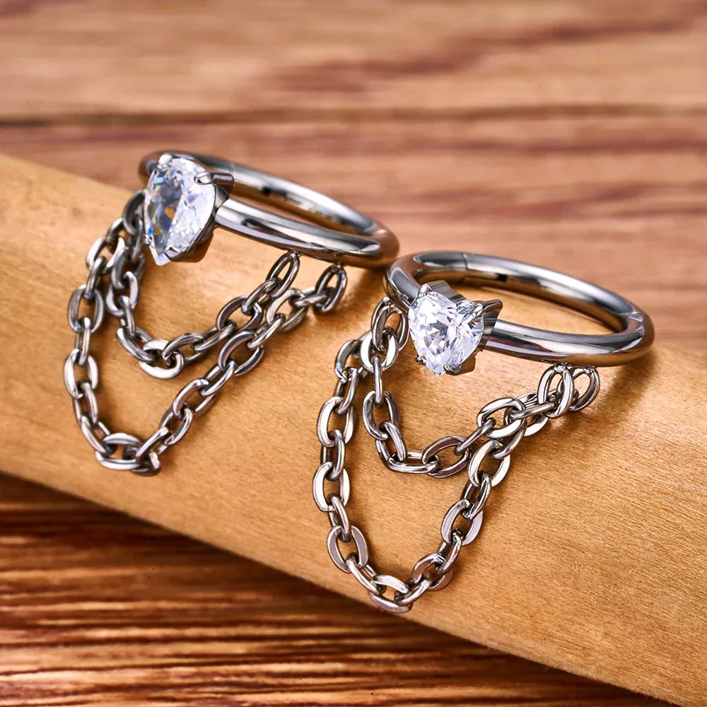 Conch hoop with chain 16G with a heart CZ stone chain conch earring silver and gold titanium hinged clicker