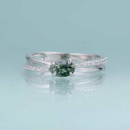Moss agate wedding ring with a cross-shaped design in silver